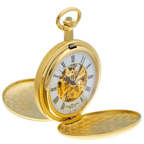 Gold pocket watch with two open covers.