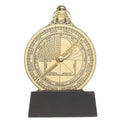 Brass astrolabe on black stand.