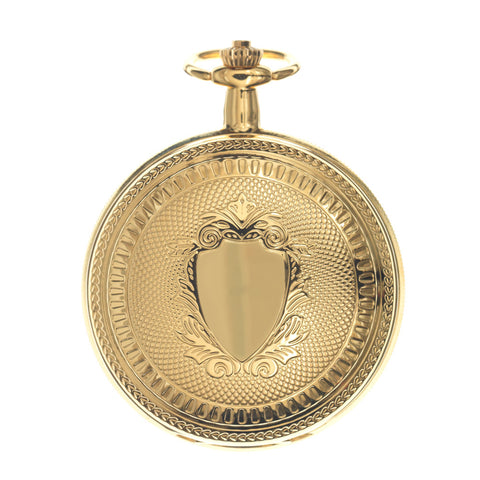 Engraved pattern on lid of gold pocket watch.