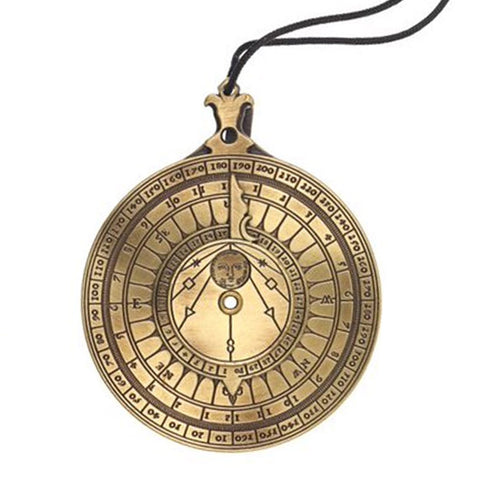 Circular brass instrument with calendar engravings and black string.