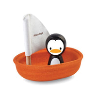 Wooden Orange Sailing Boat Bath Toy with Penguin