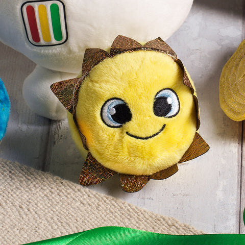 Yellow plush toy sun with a smiley embroidered face and glittery gold fabric rays.