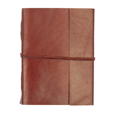 Front of brown leather journal with leather string fastening.