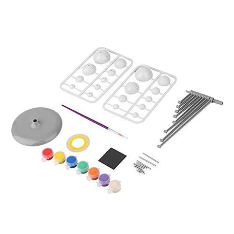 Contents of the solar system model kit, including paints.