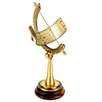 brass equitorial sundial on wooden base